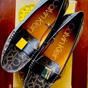 Calvin Klein Lisa monogram loafers.  Women size 9.5 never worn.